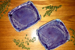 2 purple square plates with thyme texture
